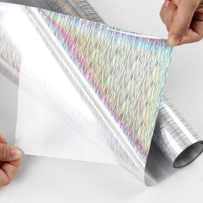 Metallic Soft - МЕ777. СЕРЕБРО ГОЛОГРАММА ДОЖДИК. Подложка клейкая. Толщина 80-90 микрон. Ширина 50 см.