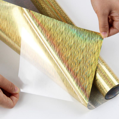 Metallic Soft - МЕ776. ЗОЛОТО ГОЛОГРАММА ДОЖДИК. Подложка клейкая. Толщина 80-90 микрон. Ширина 50 см.